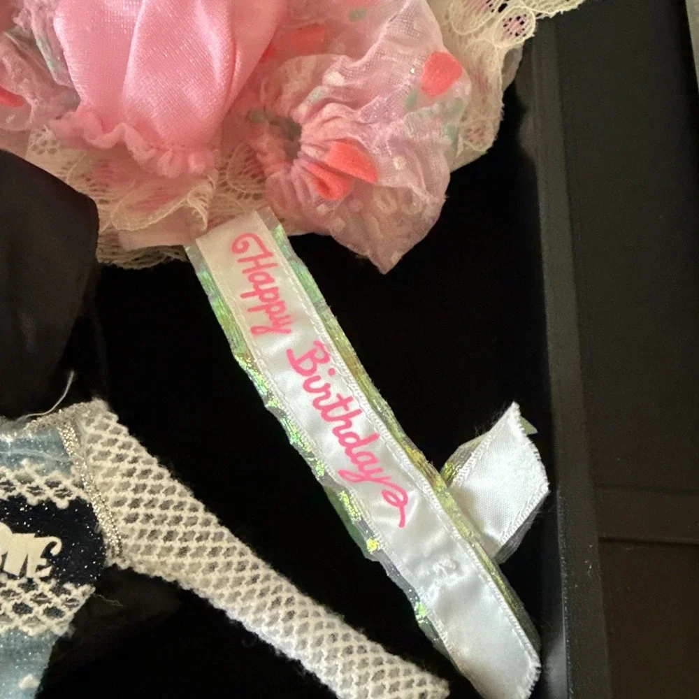 Lotof Barbie doll clothesincluding 1‎ gown, o1 purse, a tuxedo Coat shirt, &more